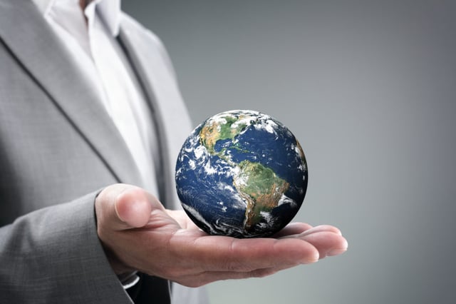 bigstock-Businessman-holding-the-world-92182835-1024x683